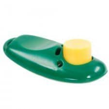 Green dog training clicker with a yellow button