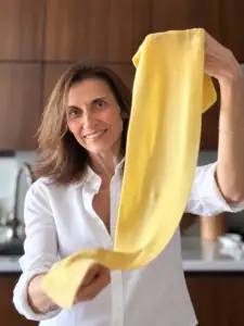 Laura holding pasta sheet