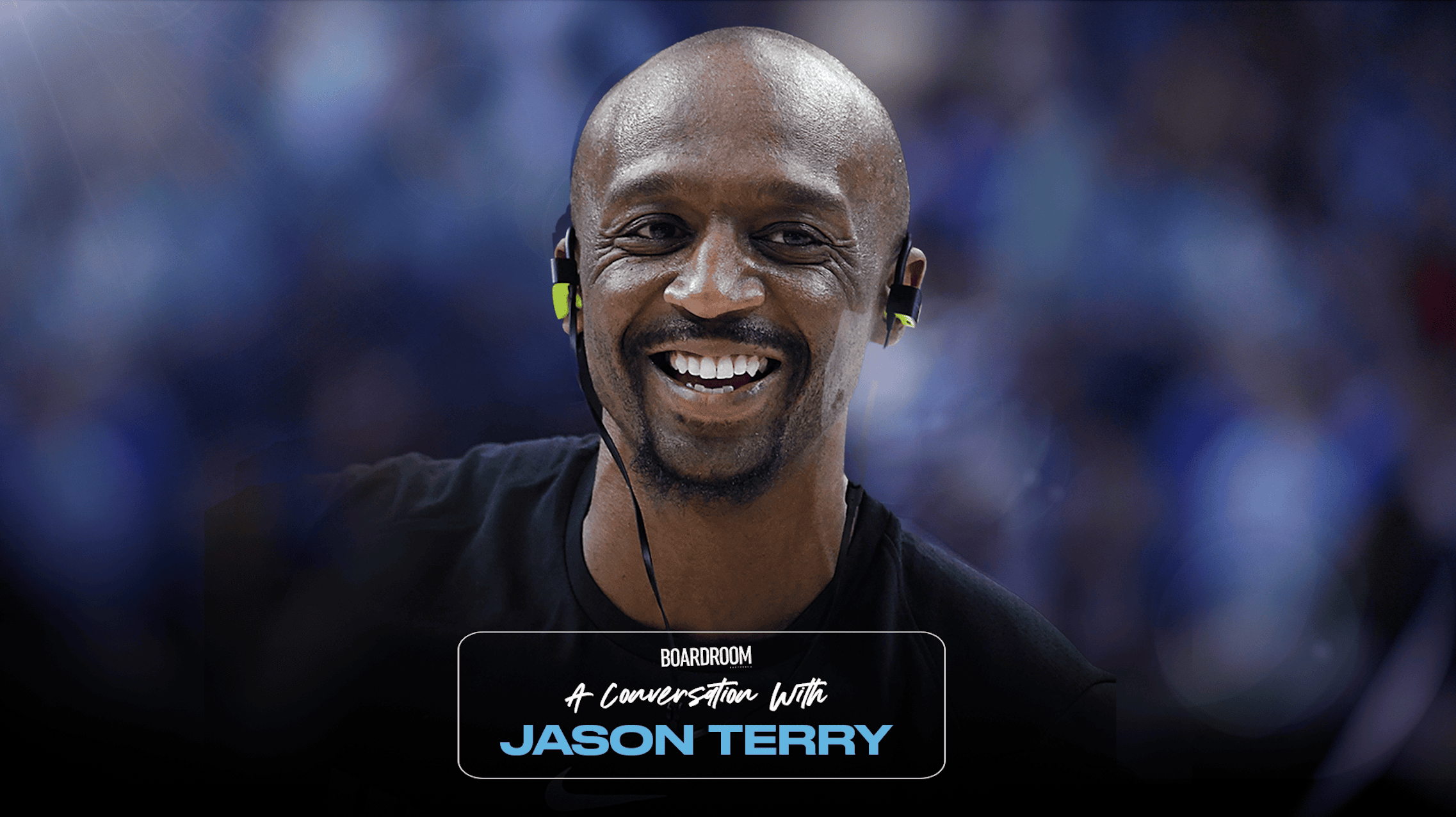 NBA champion guard Jason Terry looking on from the sideline during a basketball game