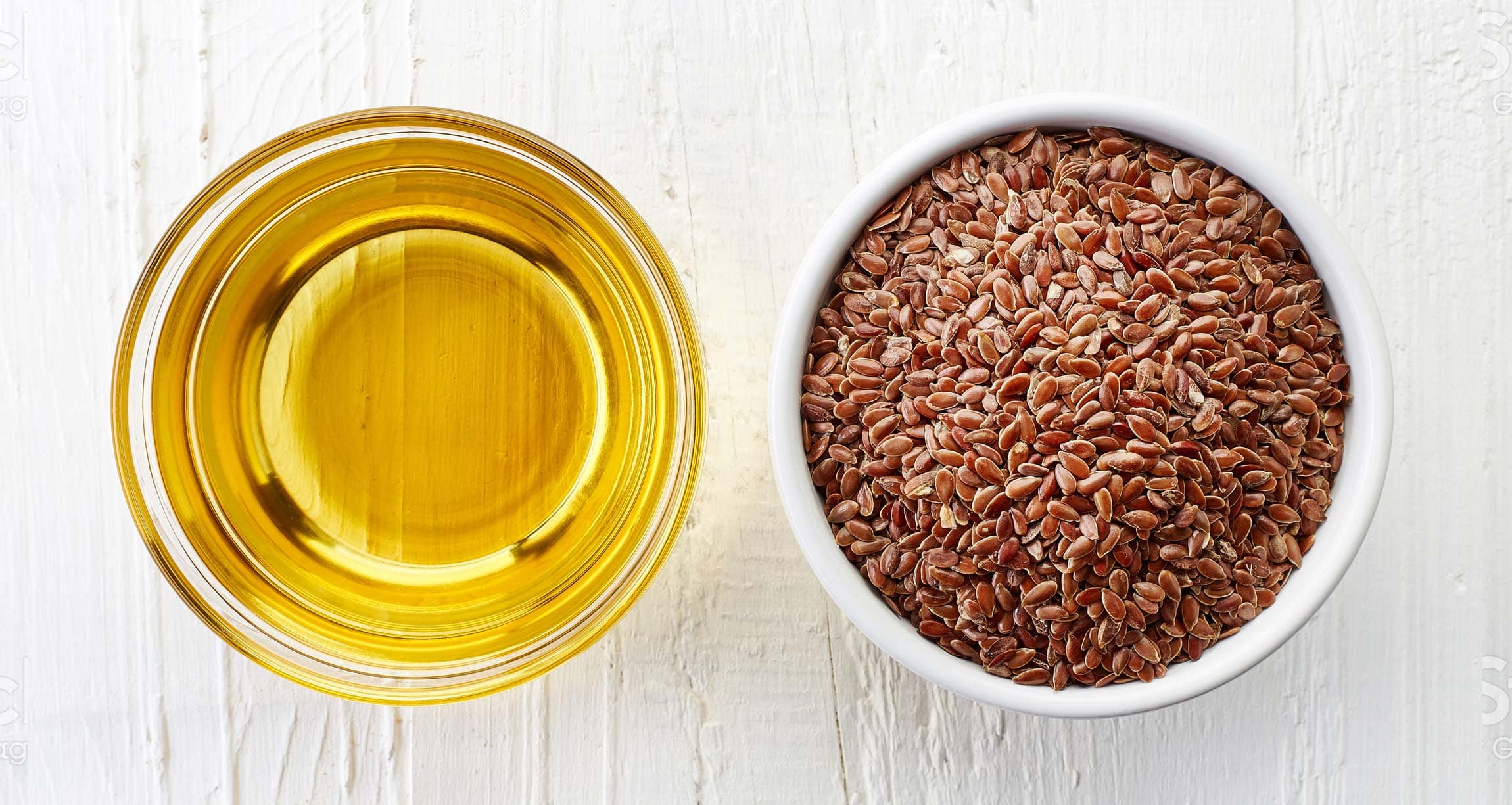 bowls of flaxseeds and oil