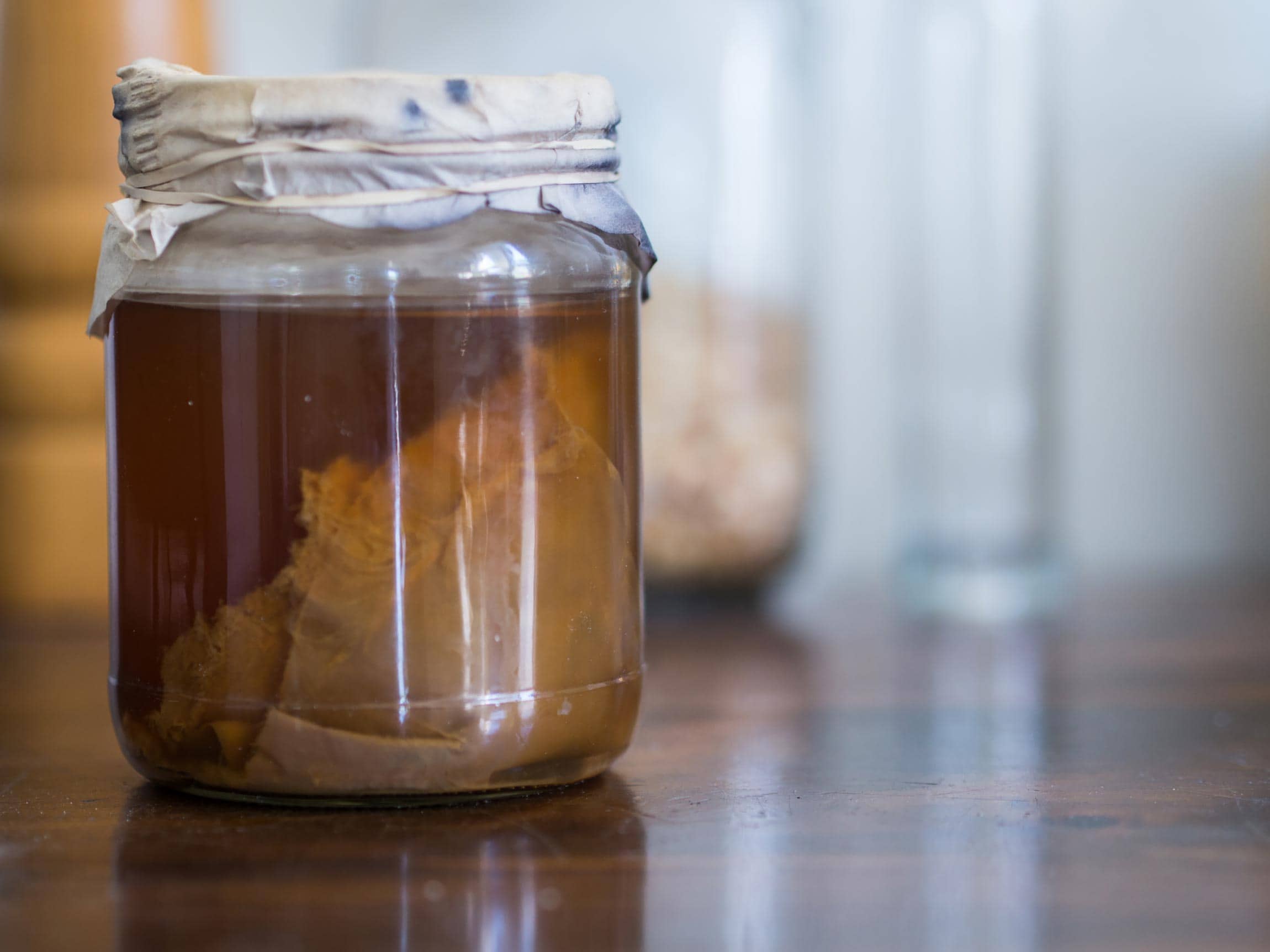 jar of kombucha on a table