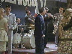 John Sawoski (with hair dyed red) plays Gerry Mulligan in LA Confidential
