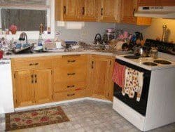 A messy kitchen illustrating the importance of puppy proofing the room