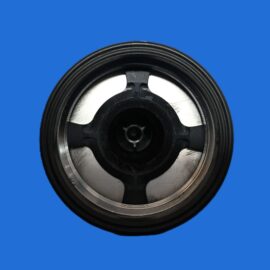 Close-up of a metal circular mechanical component with black and silver inner parts on a blue background, photographed head-on.