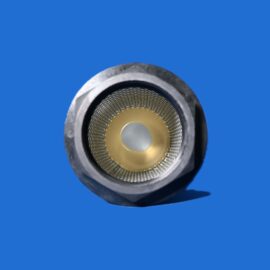 Close-up of a metal cylindrical component with a perforated inner lining and central disk, set against a blue background.