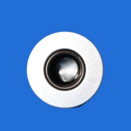 Close-up of a camera lens with a metal ring against a solid blue background