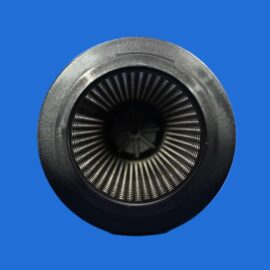 Close-up of a metal turbine housing with radial blades, viewed from the front against a blue background.