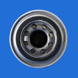 Close-up of a metal car wheel rim with circular holes against a solid blue background, emphasizing the rim's edge.