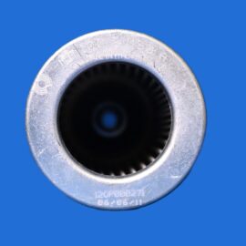 Close-up of a silver metal circular component with a black hollow center on a blue background.