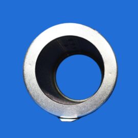 Close-up of a silver metal washer ring against a solid blue background, macro shot.