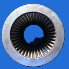 Close-up of a worn metal circular flange with inner turbine blades, set against a solid blue background.