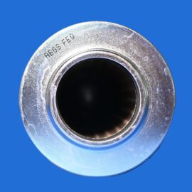 Macro close-up of a silver metal circular flange with a dark center against a solid blue background