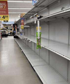 Empty shelves in aisle 10 of Food Lion. Photo courtesy of Amanda Barber.