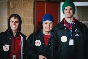 Home 12 A historic photo of three Bloomington students volunteering at an IU gamer\