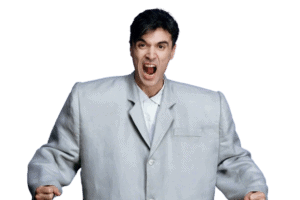 David Byrne wearing big shoulder suit