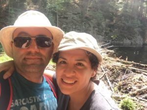 Joe From T.O. and Charo standing next to a beaver dam at Beaver Pond Trail in Algonquin Park