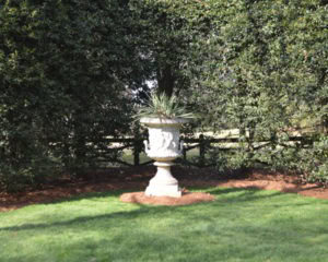 A gorgeous urn from Kenneth Lynch and Sons in Connecticut. Set on an axis with the pergola and sculpture at the other side of the garden. 