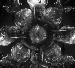 Surreal black and white fine art portrait featuring multiple screaming human expressions surrounded by transparent sculptural forms, photographed by Atlanta artist Diego Salcedo.