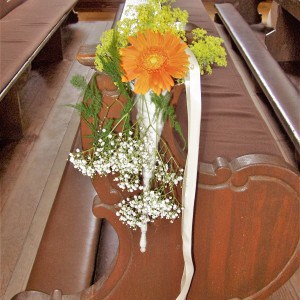 Bankgesteck mit Gerbera