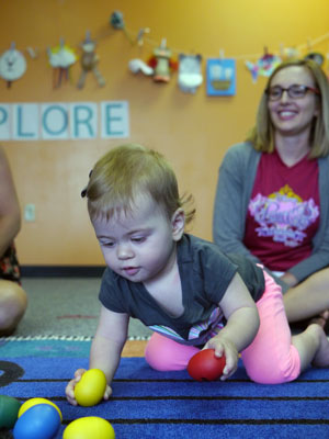 Playing with egg shakers in our Baby Rock baby music class.