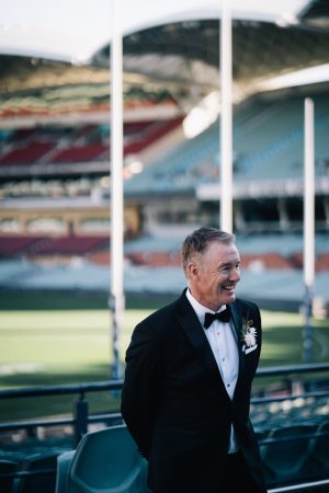 groom smiling at Adelaide oval wedding ceremony