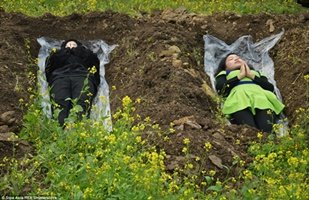 Chinese divorcees lie in 'graves'