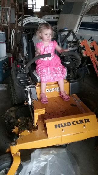 Hazel likes the lawn mower