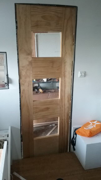 The door from tthe inside, before the trimming and weather proofing.