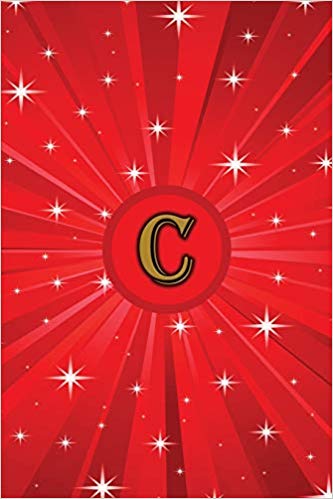 Red journal with monogramed letter C surrounded by stars.