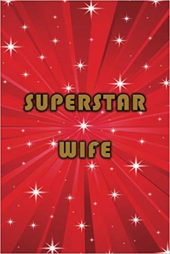 Red journal with a starburst design and golden text reading "Superstar Wife," perfect for journaling or gifting.