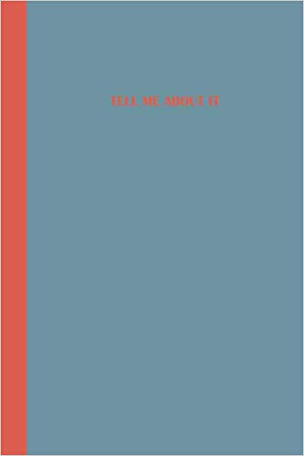 Slate blue journal with an orange spine and matching orange text displaying the phrase "Tell Me About It."