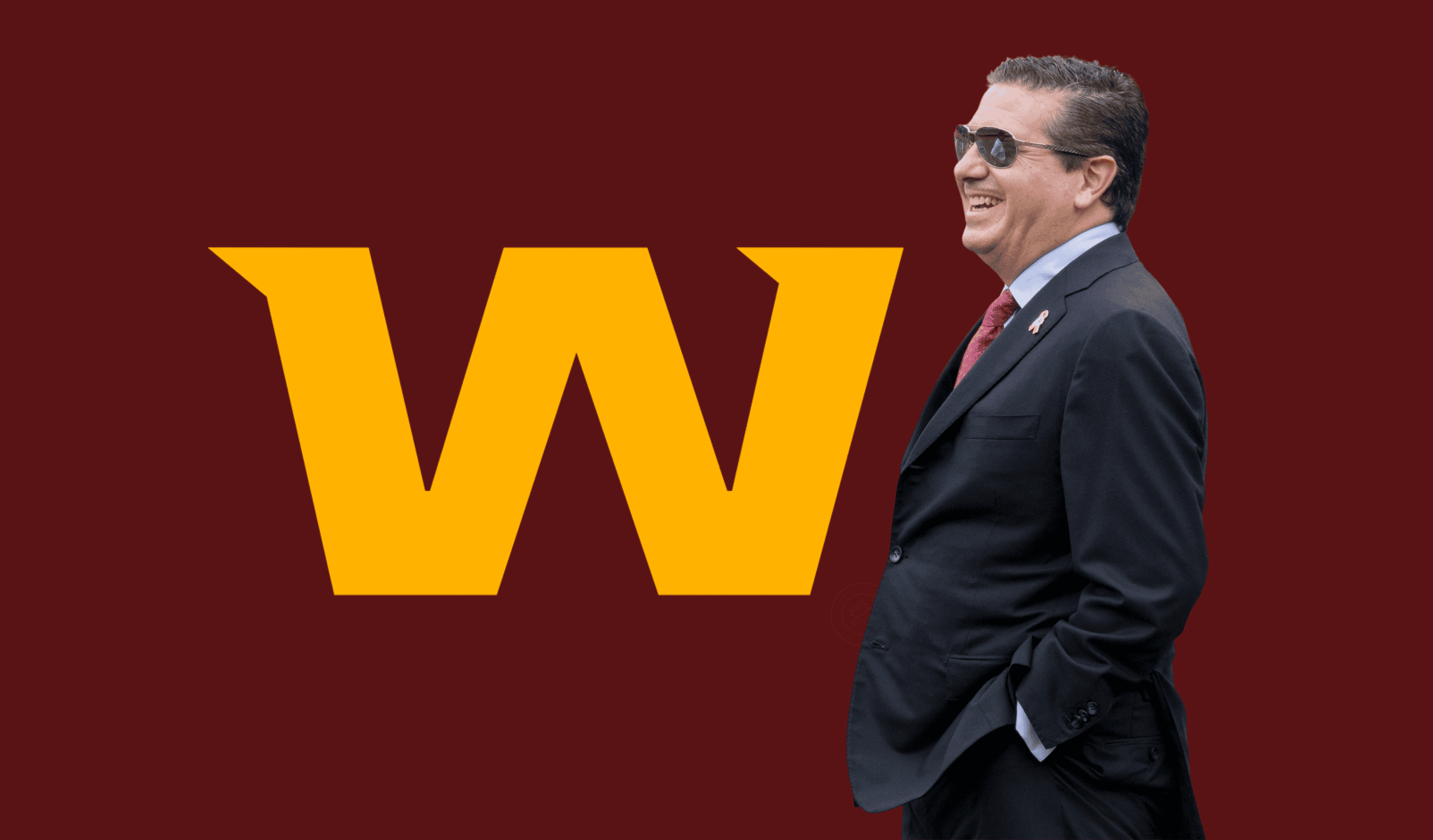Washington Football Team owner Daniel Snyder laughs