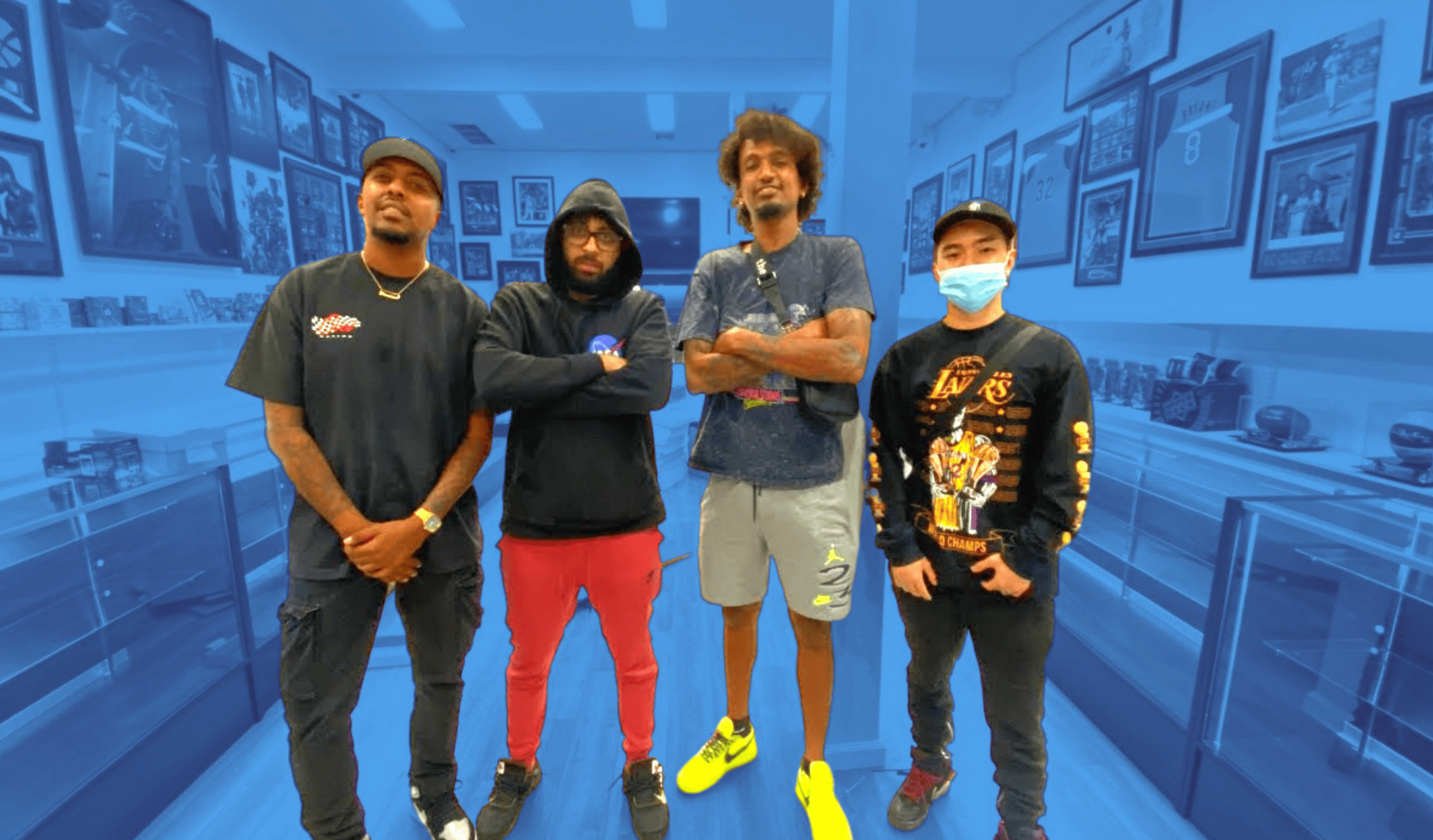 The staff of Melrose Sports Cards trading card shop in Los Angeles, California