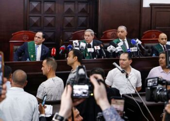 Judge Bahaeldin al-Merri (C) talks during the first trial session of Mohamed Adel at Mansoura courthouse, Adel who accused of premeditated murder of a student Nayerah Ashraf at Mansoura University north of Egypt's capital on June 26, 2022. - KHALED DESOUKI/AFP via Getty Images