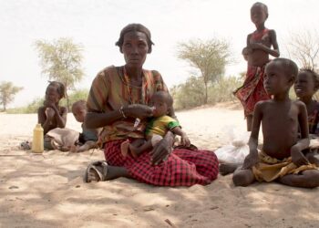 A mother feeding her malnourished child in Ileret, northern Kenya.