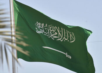 A picture taken on September 22, 2020 shows a Saudi national flag in the capital Riyadh. From scrubbing hate-filled school textbooks to a taboo-defying religious sermon, Saudi Arabia is pushing for another kind of normalisation after declining to establish formal relations with Israel -- co-existence with Jews. (Photo by FAYEZ NURELDINE / AFP)