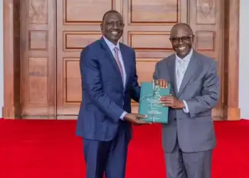 President William Ruto (left) receives the report of Presidential Taskforce on the Review of the Legal and Regulatory Framework Governing Religious Or
