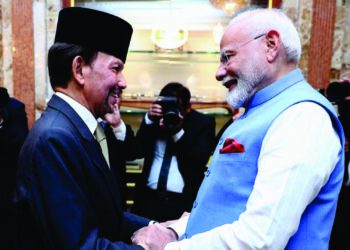 India’s prime minister Narendra Modi (R) shakes hands with Brunei Sultan Hassanal Bolkiah (L) prior to a meeting at Istana Nurul Iman in Bandar Seri Begawan on 4 September 2024 (AFP via Getty Images)
