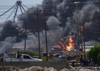 Smoke billows in the Red Sea city of Port Sudan after drone strikes by the paramilitary Rapid Support Forces (RSF), 6 May 2025. Photograph: AP