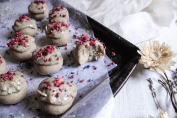 decorated earl grey lavender cake balls on a cookie sheet