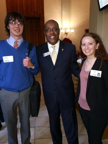 SSDP chapter leader Jeremy Sharp (left) and SSDP alum Esmee Bancroft (right) with GA Rep. (middle)
