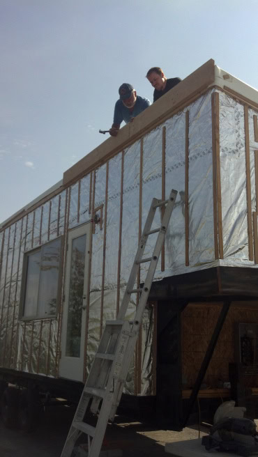 Even if I couldnt bring myself to be on the roof again... right away, James and dad hung the trim.