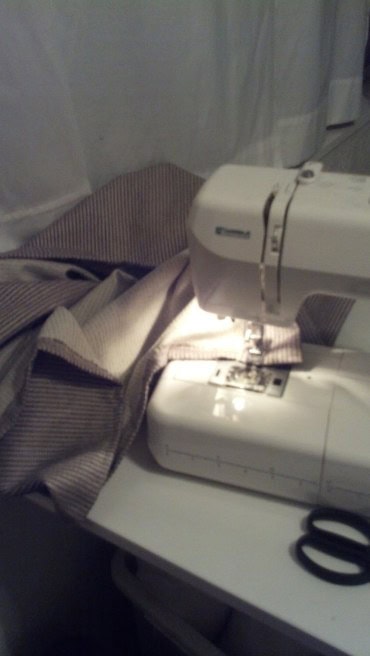 I made some thicker curtains, I sort of figured I would need to but with the single digits creeping in you could stand in the middle of the living room and feel the cold radiating in from both sides through the windows. I cut out and started sewing Friday night and finished up this afternoon