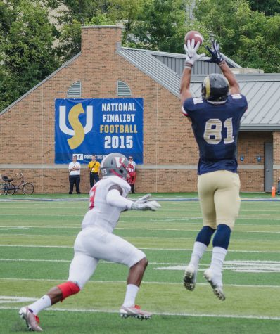 Billy Brown catches another pass gaining more yards for the Rams.