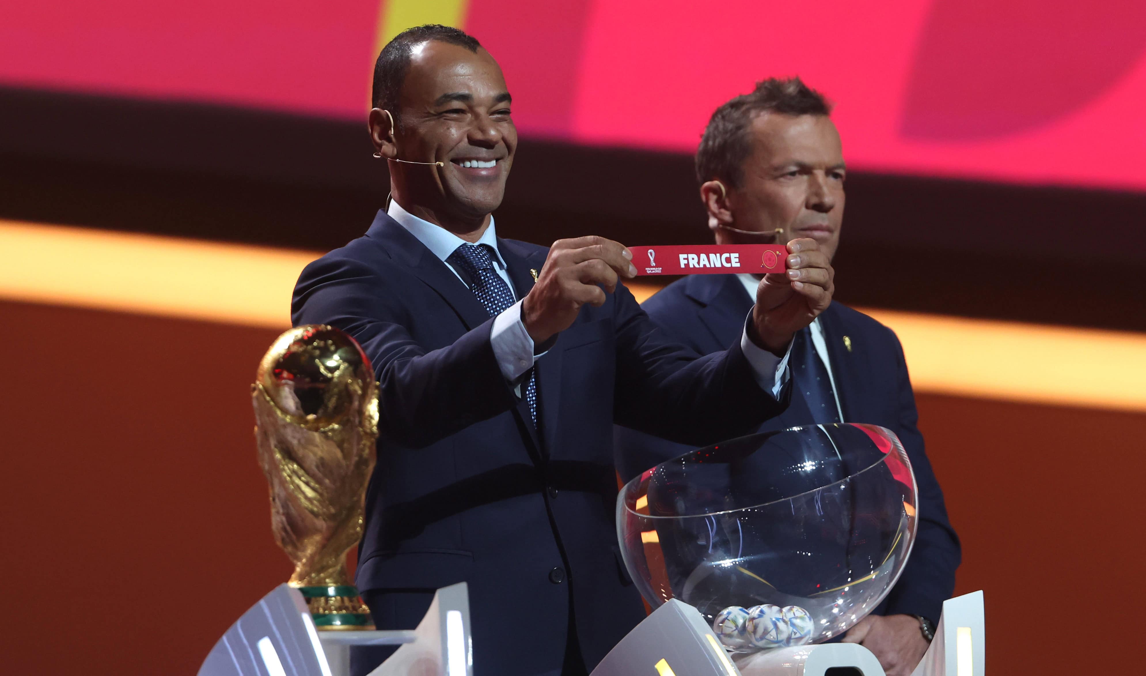 Brazil legend Cafu drawing a piece of paper displaying France's name at the FIFA World Cup Draw 2022