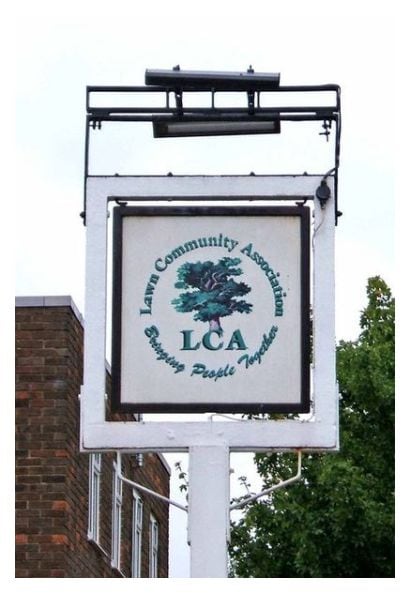 The picture of the Lawn Community Association, Swindon sign by P. L. Chadwick. Believed to be in the public domain (sourced from Wikimedia Commons) 2008. The premises were for many years a pub known as The Gamekeeper. For more on the association: http://www.lawninfo.net/