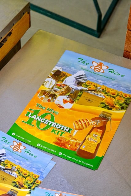 Colorful The Hive Group brochure promoting a Langstroth kit with honey and beekeeping imagery.