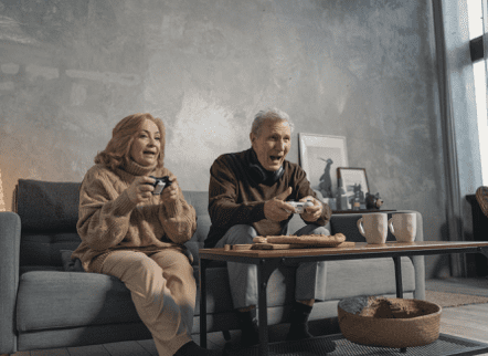 15 At-Home Date Night Activities 5 elderly couple playing video game in the living room