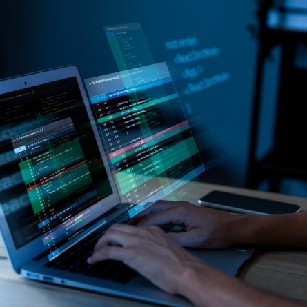 programming background with person working with codes computer 1