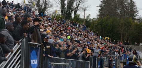 Fans celebrate after the touchdown that won Shepherd Rams the game Saturday. 